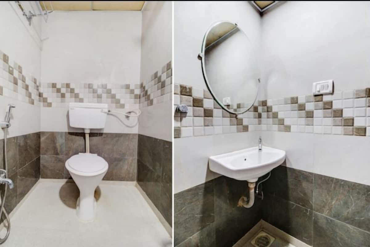 Shower, rainfall showerhead, towels, soap