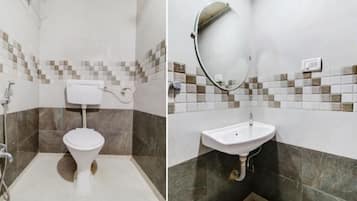 Douche, douche à « effet pluie », serviettes fournies, savon