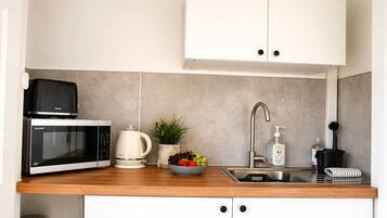 Fridge, microwave, electric kettle, toaster