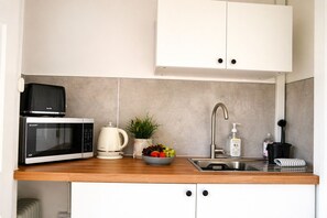 Fridge, microwave, electric kettle, toaster