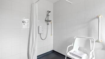 Shower, hair dryer, towels, shampoo