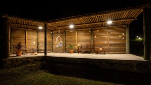 An outdoor patio area with a wooden pergola, seating, and potted plants. - Tradicampo-Quinta das Cycas-O Granel-360º Panoramic view - NEW LISTING  (Algarvia, Nordeste)