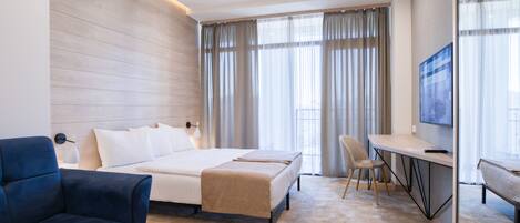 Premium bedding, down duvets, memory-foam beds, minibar