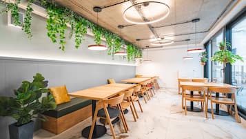 Shared fridge, microwave, dining tables