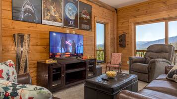 Smart TV, fireplace, table football, books