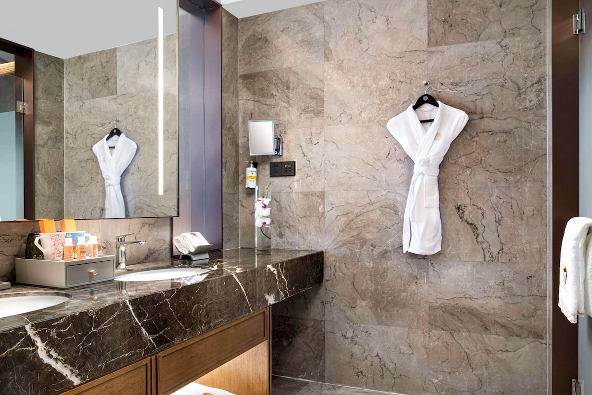 Family Room, 2 Double Beds, City View | Minibar, in-room safe, desk, laptop workspace