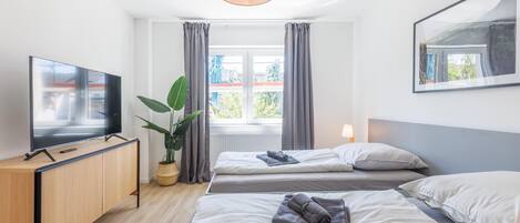 Apartemen Klasik | 2 kamar tidur, setrika/meja setrika, Wi-Fi gratis, dan seprai linen