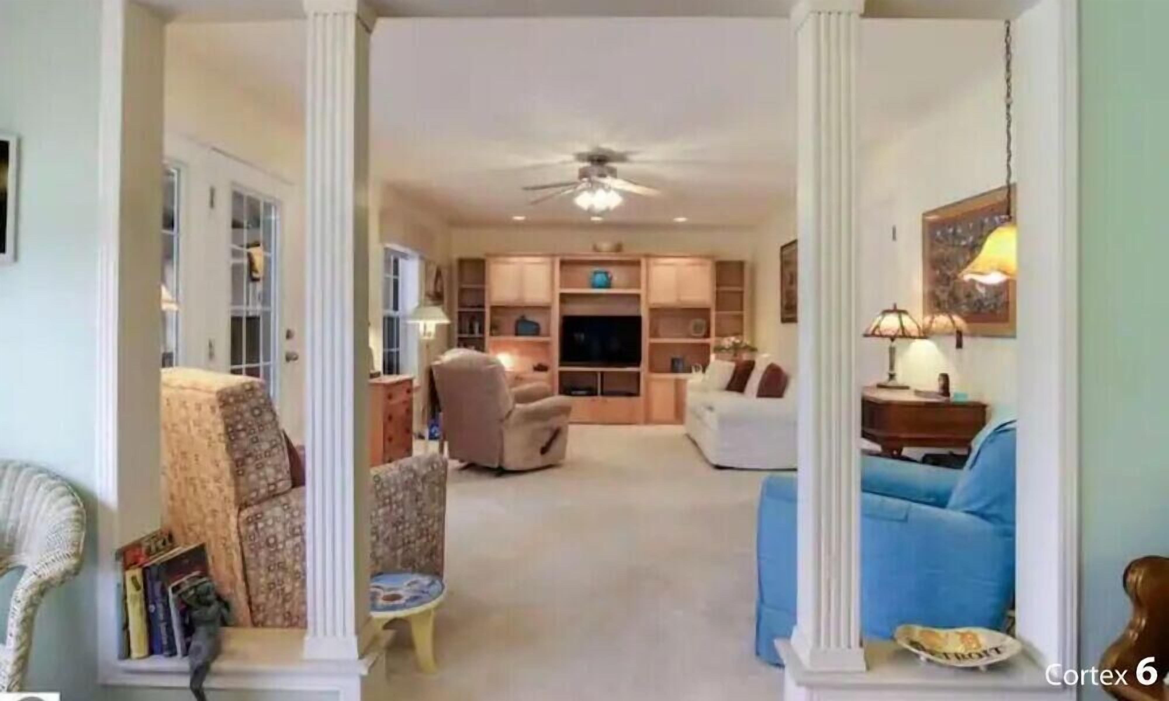 Smart TV, fireplace, books, stereo