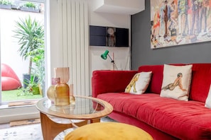 Basic Apartment, Multiple Beds | Living area | TV - Swanky Apartment in Bethnal Green With Garden (London)