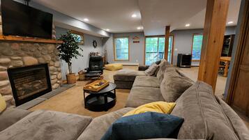 Smart TV, fireplace, table tennis, books