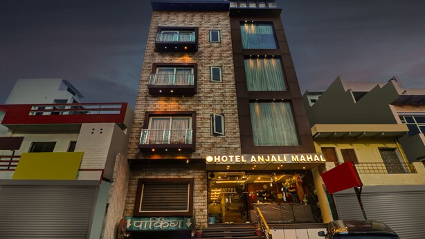 A multi-story hotel with balconies, a sign reading "HOTEL ANJALI MAHAL," and a visible entrance. - Itsy Hotels Anjali Mahal 500, Mtrs From Mathura Railway Station (Mathura)