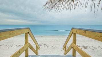 On the beach, sun-loungers, beach towels