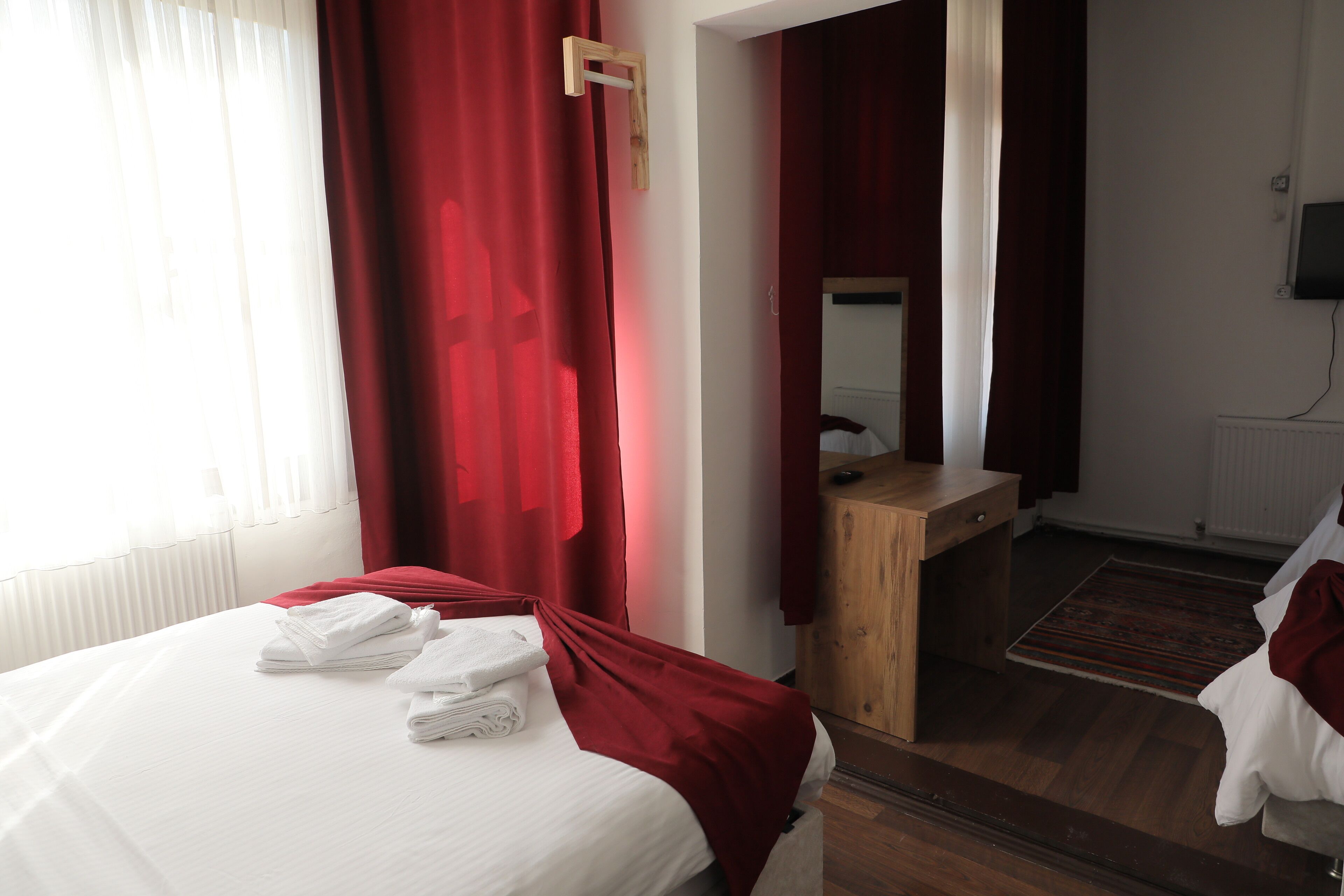 Comfort Quadruple Room | Premium bedding, free WiFi, bed sheets