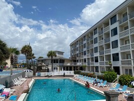 Outdoor pool, open 8:00 AM to 6:00 PM, pool umbrellas, pool loungers