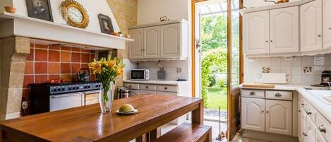Dishwasher, high chair, dining tables