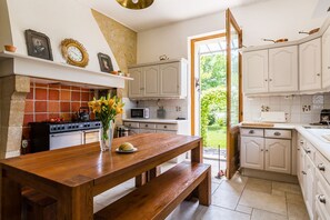 Dishwasher, highchair, dining tables