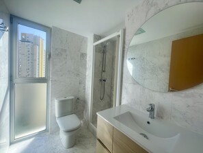 Bathtub, hair dryer, towels