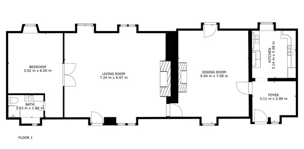 Grundriss eines Hotelzimmers mit Schlafzimmer, Wohnzimmer, Essbereich, Küche und eigenem Badezimmer.