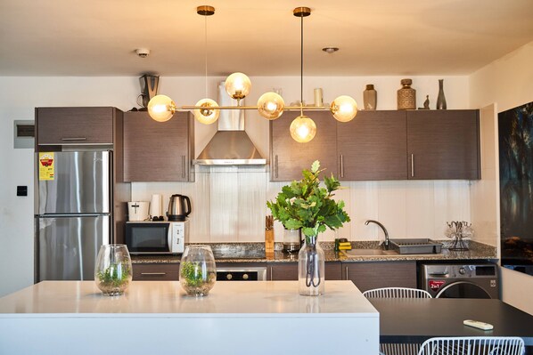 Fridge, microwave, oven, stovetop - One Bedroom Pent-house. (Accra)