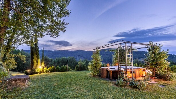 A gazebo with a ladder, surrounded by a grassy area with trees and a mountain view in the background. - San Veriano - Five Bedroom Villa, Sleeps 10 (Ripoli)