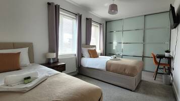 4 bedrooms, desk, laptop workspace, iron/ironing board