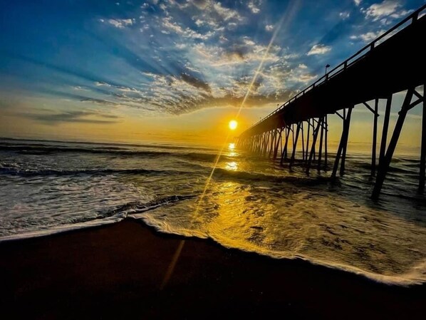 Stroll along the oceanfront pier, taking in the serene views of the surrounding waters.