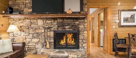 Flat-screen TV, fireplace, DVD player