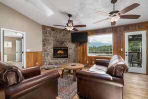 TV, fireplace - Eagles Nest: Gorgeous Views of the Great Smoky Mountains and Minutes Away From the National Park (Sevierville)