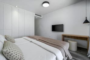 4 dormitorios, tabla de planchar con plancha, wifi y ropa de cama