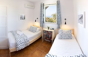 3 habitaciones, tabla de planchar con plancha, wifi y ropa de cama