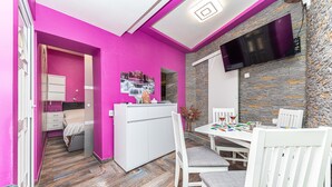 A modern kitchen with a white countertop and a built-in oven. - Apartments Keka - Studio Apartment (Kastel Sucurac)