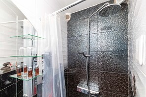 Shower, hair dryer, towels