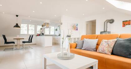 Moderne Dachgeschosswohnung mit traumhaftem Vogesenblick