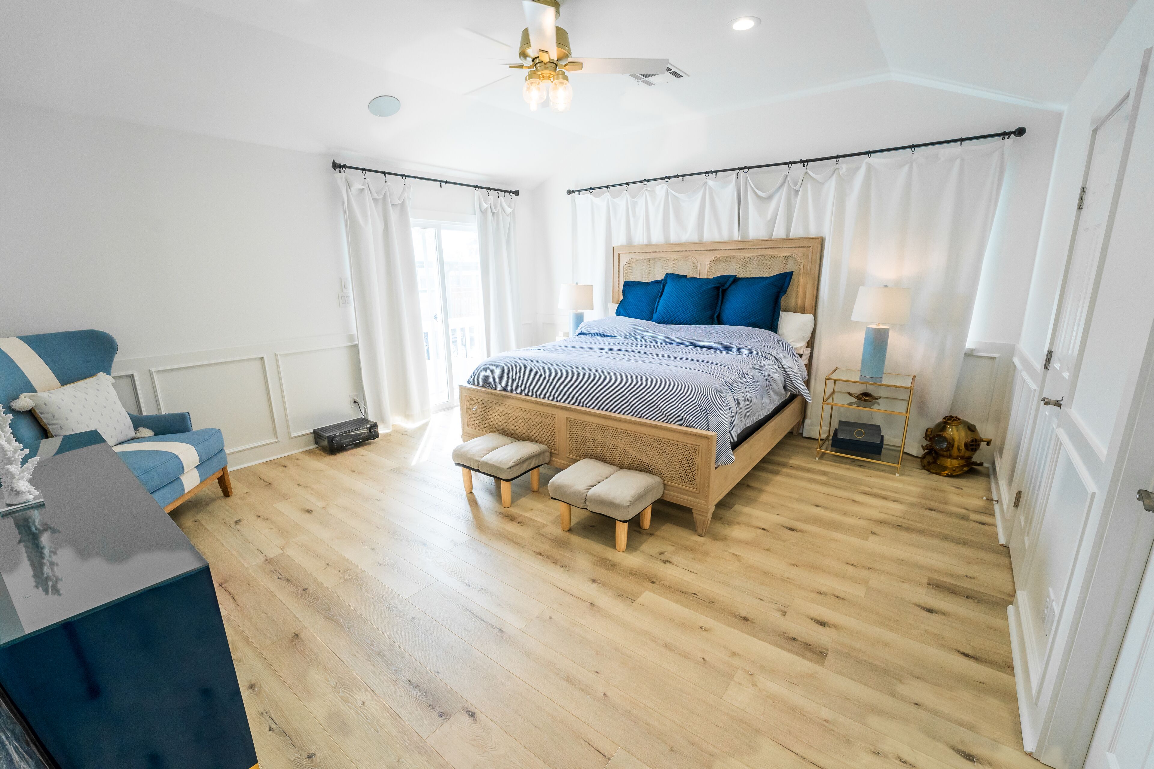primary bedroom with large t.v. 