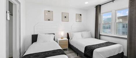 2 habitaciones, tabla de planchar con plancha, wifi y ropa de cama