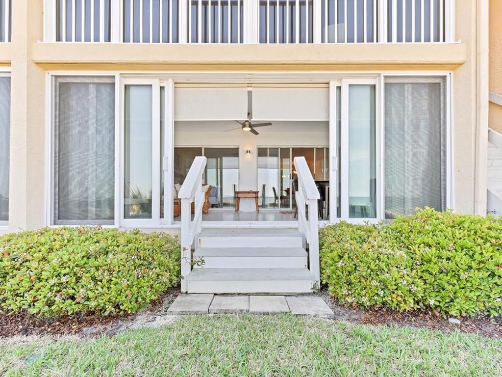 Step right on to the beach from this 2BR/2BA ground floor condo located in Retreat V