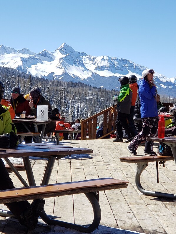 Relax on the deck with a scenic mountain view.