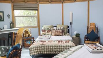 1 bedroom, desk, iron/ironing board, travel crib