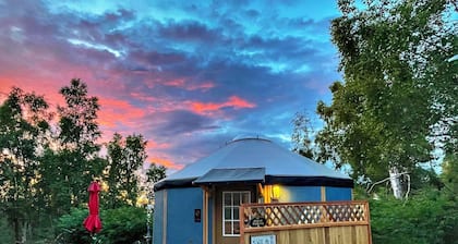 Fanciful mountainside yurt with private bathhouse