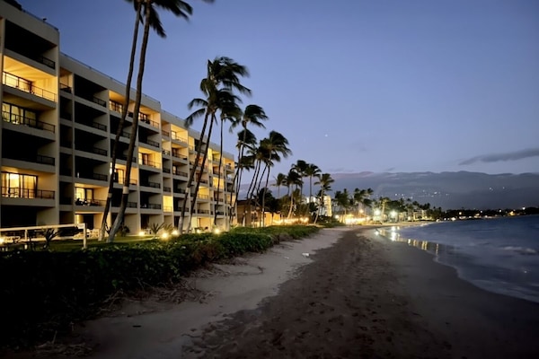 On the beach, sun loungers, beach towels