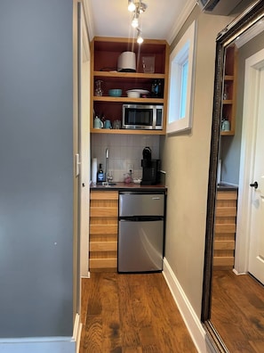 Fridge, microwave, coffee/tea maker, toaster