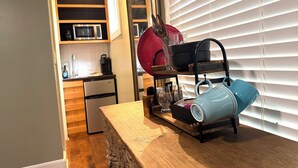 A kitchen with a wooden counter, a coffee maker, a microwave, and a refrigerator. - Old Town "Gem", Near Historic Downtown Saint Augustine (St. Augustine)