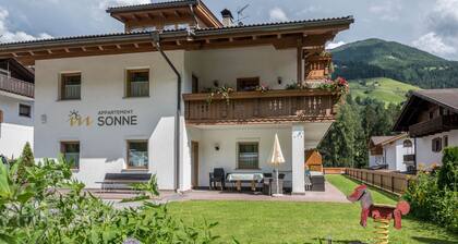 Appartement Sonne Nr. 18 avec vue sur les montagnes, jardin et Wi-Fi.