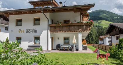 Appartement de vacances 'Sonne n° 21' avec vue sur la montagne, jardin et Wi-Fi