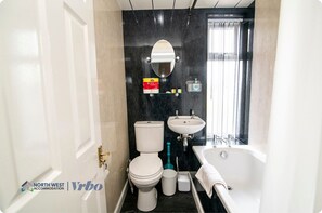 Combined shower/tub, hair dryer, towels, soap