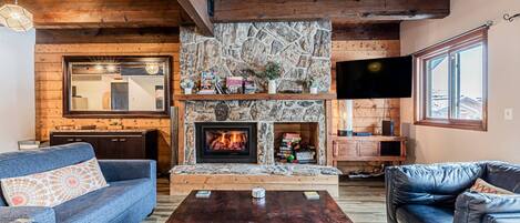 Smart TV, fireplace, foosball, books