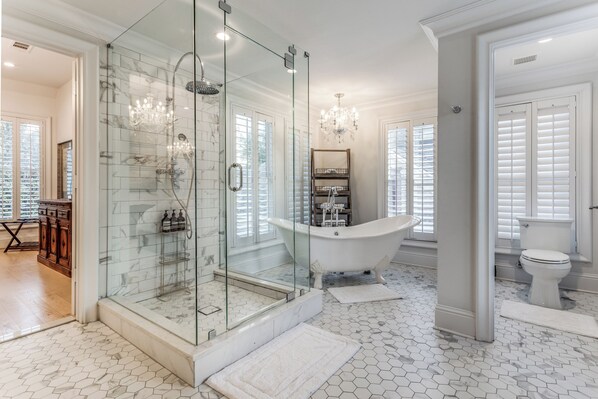 Combined shower/tub, hair dryer, towels, soap