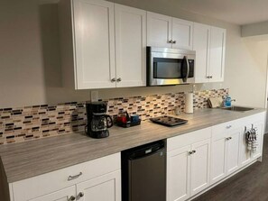 Microwave, stovetop, electric kettle, toaster