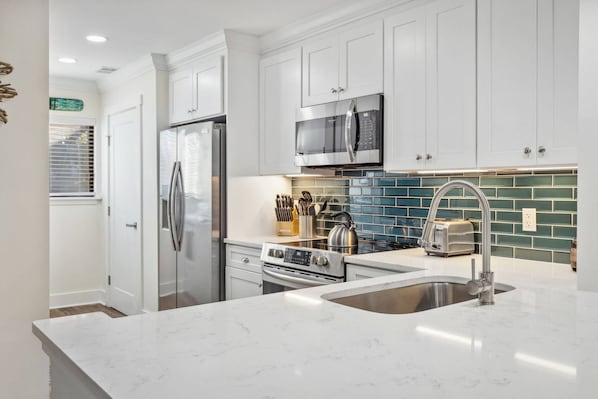 Fridge, microwave, dishwasher, coffee/tea maker