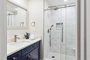 Shower, hair dryer, shampoo
